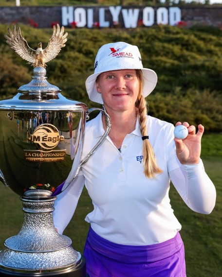 JM Eagle LA Championship 2025 Champion Ingrid Lindblad with trophy made by Malcolm DeMille